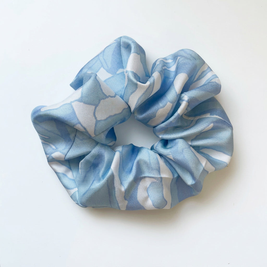 Blue silk scrunchie featuring the Lottie Wood waterlily print